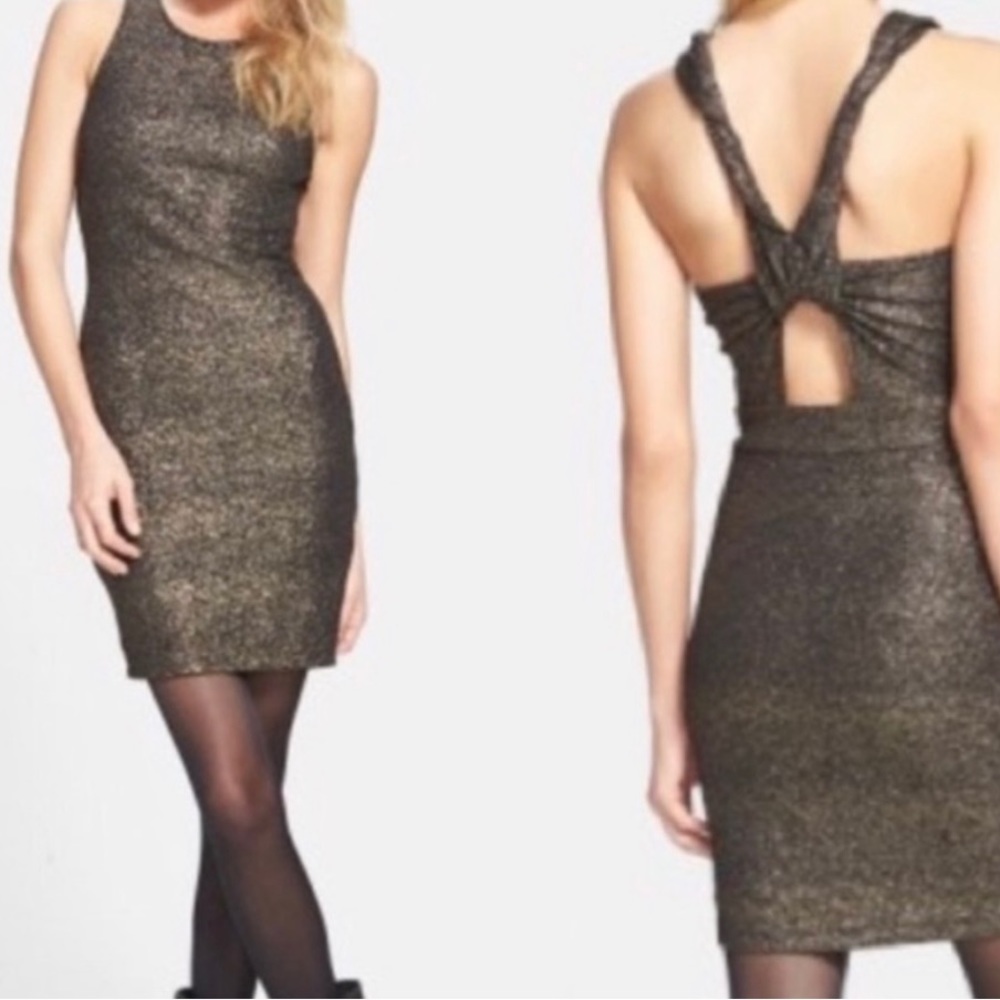Small black and gold twist back dress